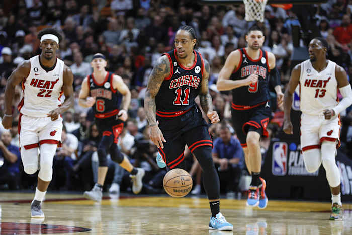 Chicago Bulls forward DeMar DeRozan (11) dribbles the basketball during the third quarter against the Miami Heat at Kaseya Center.